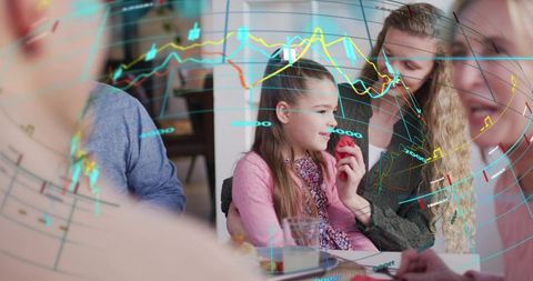 Multigenerational family gathering in kitchen with girl holding red apple and digital chart overlay