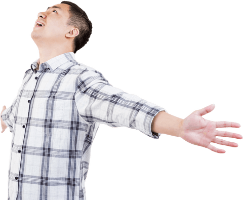 Confident man with arms outstretched enjoying freedom