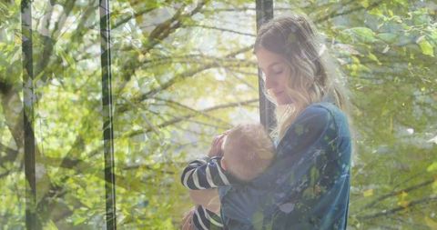 Serene Mother with Baby Embracing Nature's Calm