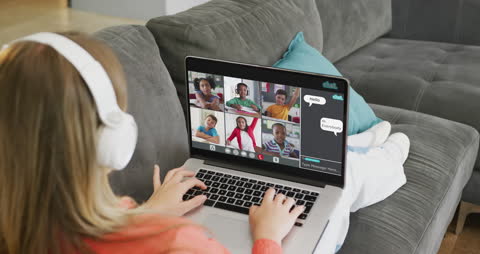 Woman Participating in Virtual Class Video Call from Home
