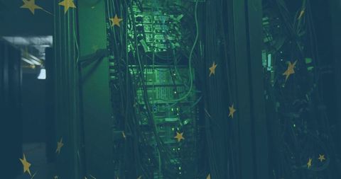 Green leds illuminate data center server rack with intricate cables