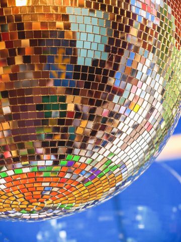 Close-up of colorful disco ball reflecting light