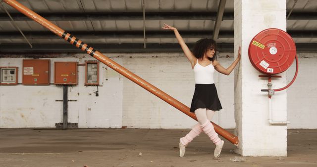 Ballerina Rehearsing in Urban Warehouse - Download Free Stock Images Pikwizard.com