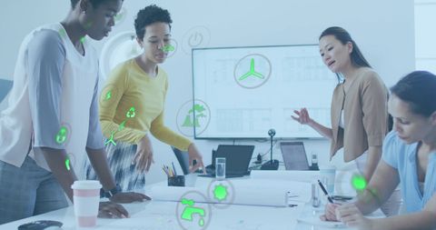 Diverse Female Architects Collaborating on Innovative Floor Plan