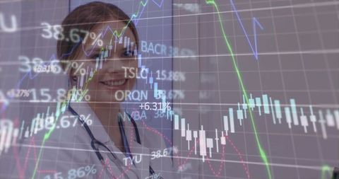 Doctor Analyzing Financial Statistics with Digital Overlay in Clinic