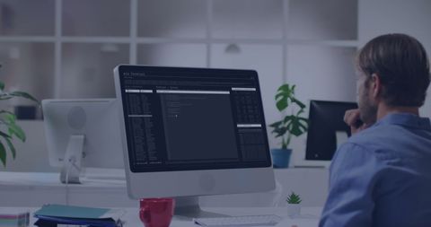 Developer Working on Computer with Digital Interface Display - Download Free Stock Images Pikwizard.com
