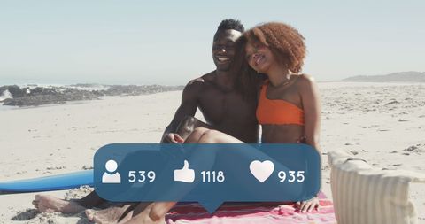 Happy Couple Enjoying a Beach Day with Social Media Icons