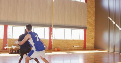 Dynamic Indoor Basketball Game with Diverse Team - Download Free Stock Images Pikwizard.com