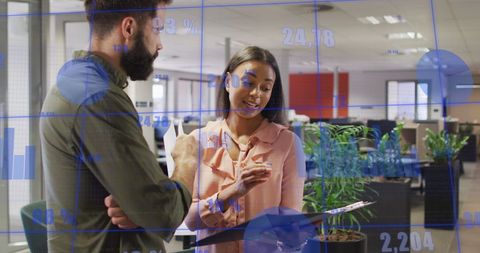 Business Team Analyzing Data Trends in Modern Office Environment