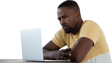 Transparent Background: Man Using Laptop Thoughtfully at Table - Download Free Stock Videos Pikwizard.com