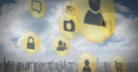 Digital icons over skyline representing technology and connectivity