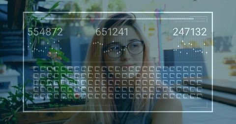 Tech Professional Engaging with Futuristic Data Interface in Urban Workspace