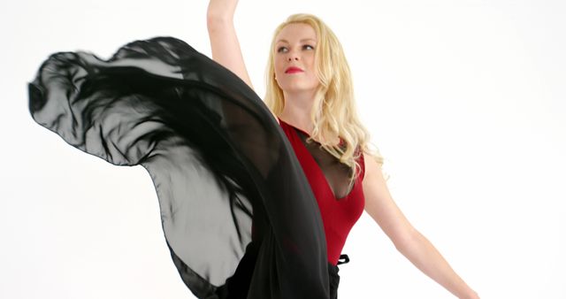 Elegant Woman Dancing with Black Flowing Dress - Download Free Stock Images Pikwizard.com