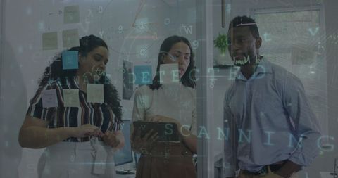 Diverse Team Collaborating on Tech Project in Modern Office