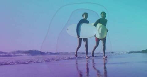 Active surfer couple enjoying beach adventure