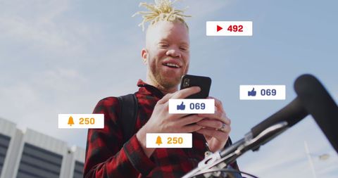 Social Media Engagement Concepts with Smiling Man Using Smartphone