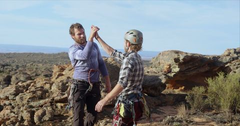 Two Rock Climbers Celebrating Success with High Five - Download Free Stock Images Pikwizard.com