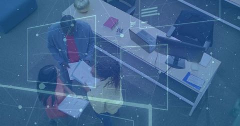 Team Collaboration in Modern Office Setting with Technology and Innovation