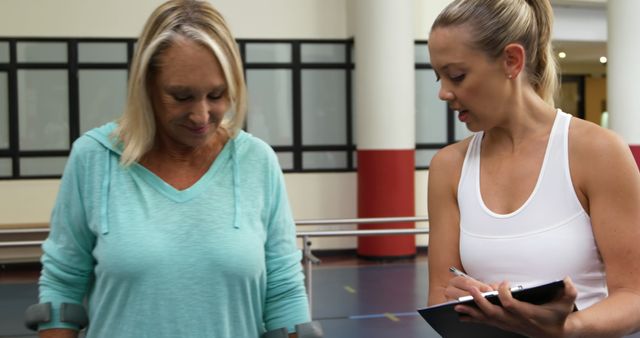 Senior Woman in Physical Therapy Session with Female Therapist - Download Free Stock Images Pikwizard.com