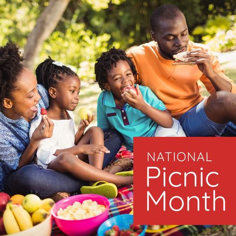Happy Family Celebrating National Picnic Month Outdoors