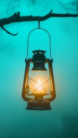 Lantern Hanging from Branch, Flame Glowing Through Teal Mist, Vertical Cinematic Loop