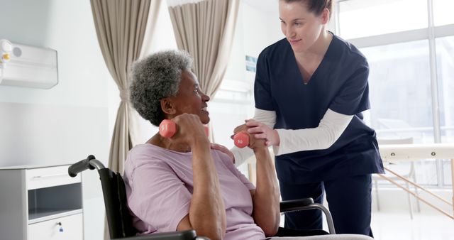 Healthcare Worker Assisting Elderly Woman with Physical Therapy Exercises - Download Free Stock Images Pikwizard.com