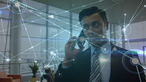 Businessman on Mobile Phone with Digital Network Overlay