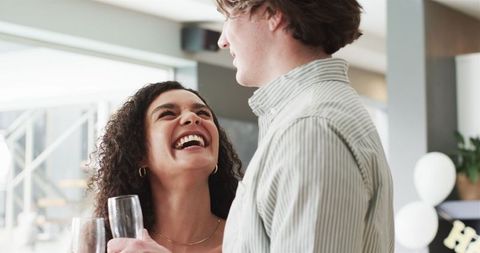 Couple Joyfully Celebrating Anniversary with Champagne Toast