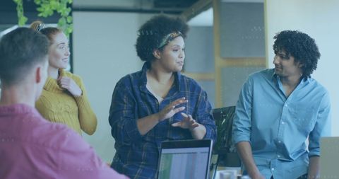 Diverse Team Collaborating in Modern Office Setting