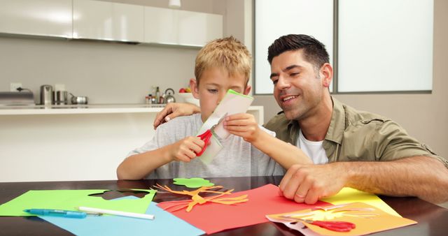 Father and Son Enjoying Arts and Crafts Together at Home - Download Free Stock Images Pikwizard.com
