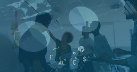 Diverse Business Team Analyzing Data and Financial Graphics