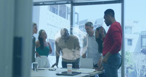 Diverse Professional Team Collaborating in Modern Office with Global Network Overlay