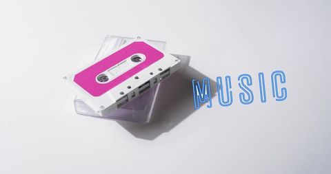 Retro pink cassette tape on clean white surface