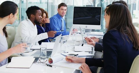 Diverse Team Engaged in Business Meeting at Modern Conference Room - Download Free Stock Images Pikwizard.com