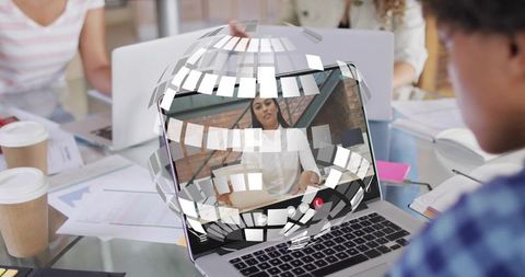 Remote collaboration on laptop with augmented reality globe and team video conference