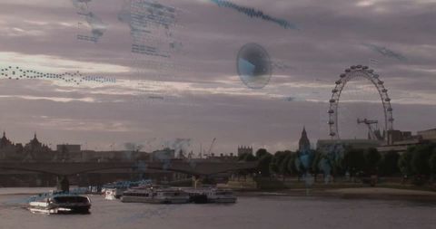 Futuristic london eye and thames riverside skyline