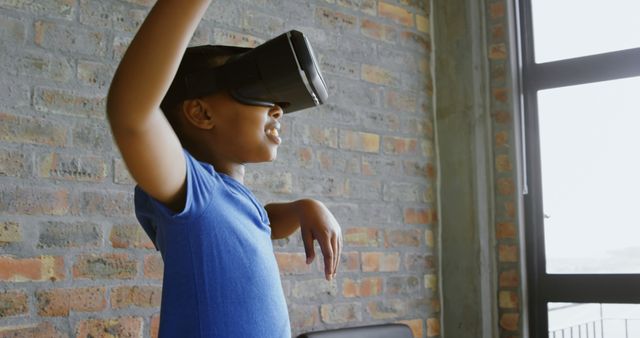 Young Boy Enjoying Virtual Reality Experience at Home - Download Free Stock Images Pikwizard.com