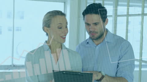 Colleagues Analyzing Statistics with Overlay of Data Graphics