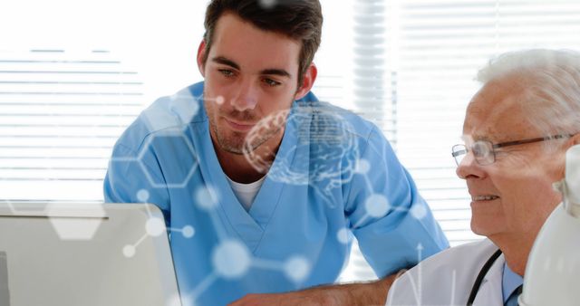 Young Doctor and Experienced Mentor Reviewing Medical Data Together - Download Free Stock Photos Pikwizard.com