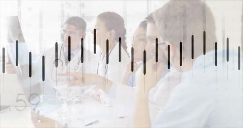 Doctors Analyzing Medical Data in Hospital Conference Room