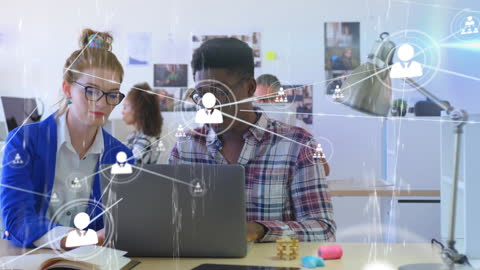 Diverse Team Collaborating with Digital Network Technology in Office