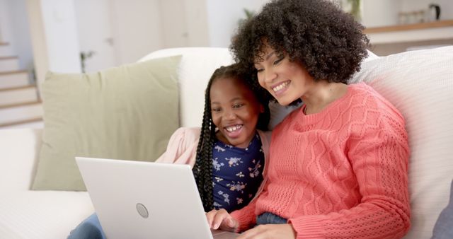 Mother and Daughter Enjoying Laptop Together at Home - Download Free Stock Images Pikwizard.com