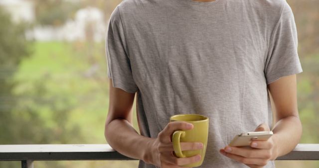 Morning Routine with Coffee and Smartphone on Balcony - Download Free Stock Images Pikwizard.com