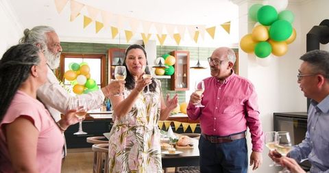 Joyful Elderly Friends Celebrating Birthday Together