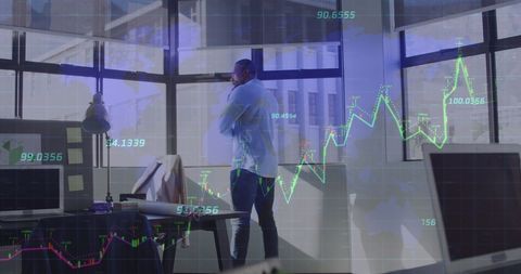 African American Businessman Analyzing Financial Data in Modern Office - Download Free Stock Images Pikwizard.com
