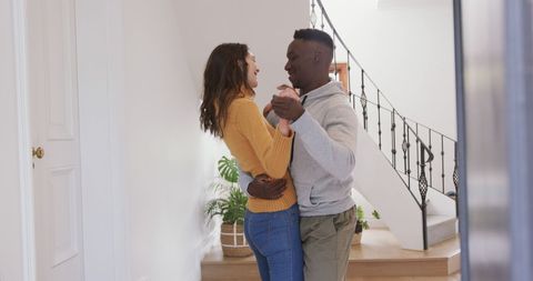 Happy Couple Dancing in Sunny Hallway at Home - Download Free Stock Images Pikwizard.com