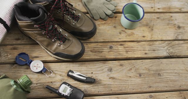 Camping Adventure Gear with Boots and Compass on Rustic Wood - Download Free Stock Images Pikwizard.com