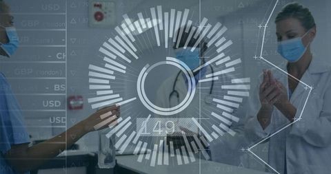 Healthcare professionals ensuring hygiene using sanitizer in hospital