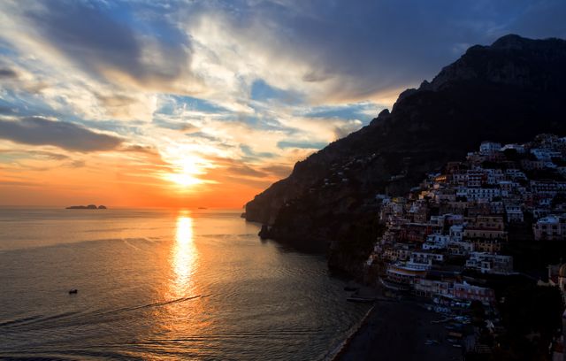 Photographers or travel bloggers can use this for showcasing Mediterranean scenery. Travel agencies can highlight sunset views for marketing vacation packages. Suitable for desktop wallpapers or backgrounds due to its scenic appeal.