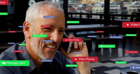 Mature Man Enjoying Modern Communication with Smartphone